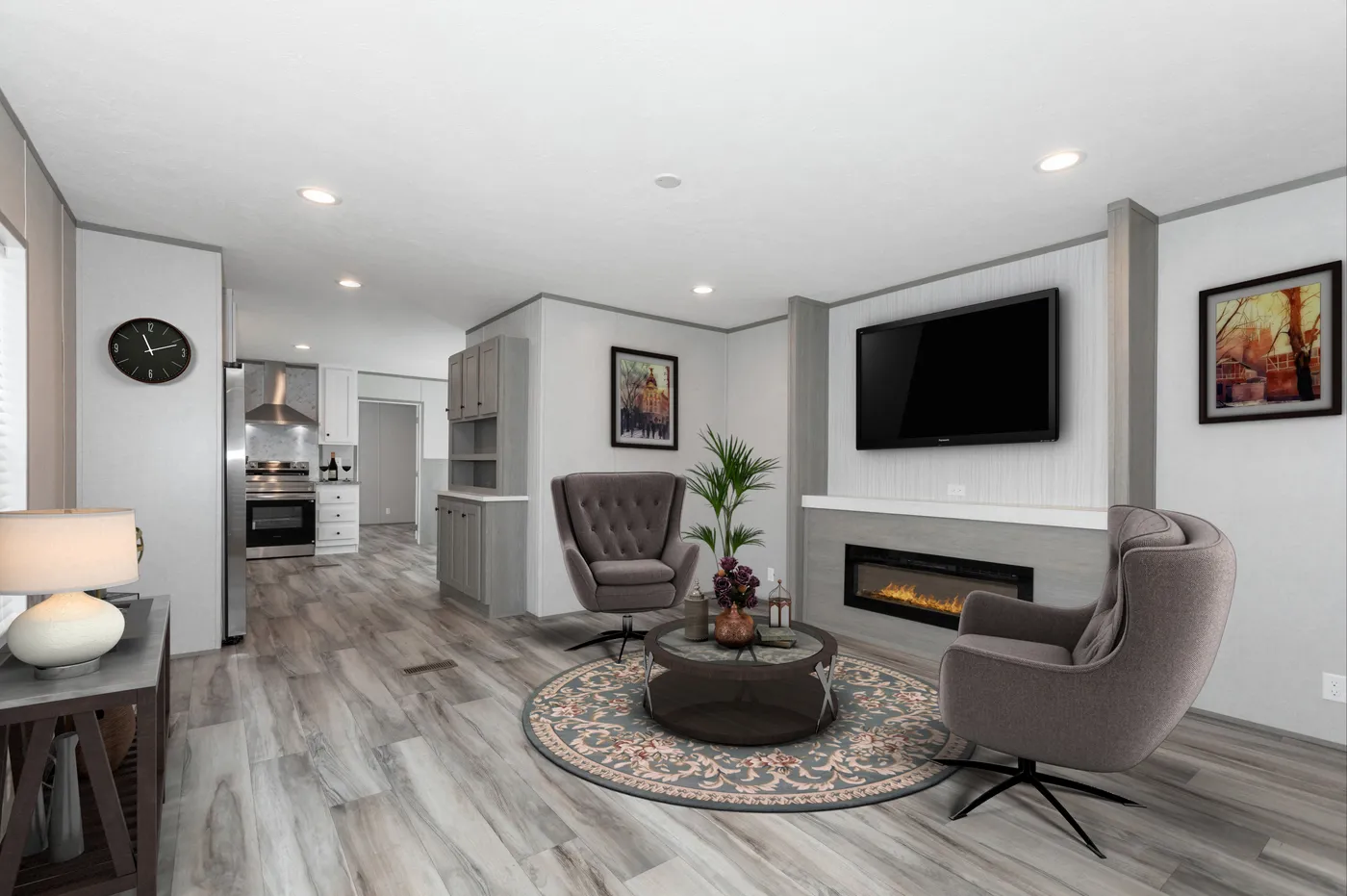The THE ULTIMATE SHOWER Living Room. This Manufactured Mobile Home features 3 bedrooms and 2 baths.