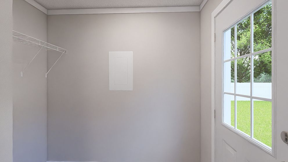 The MOVE ON UP Utility Room. This Manufactured Mobile Home features 3 bedrooms and 2 baths.