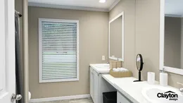 The SWEET BREEZE 72 Guest Bathroom. This Manufactured Mobile Home features 4 bedrooms and 2 baths.