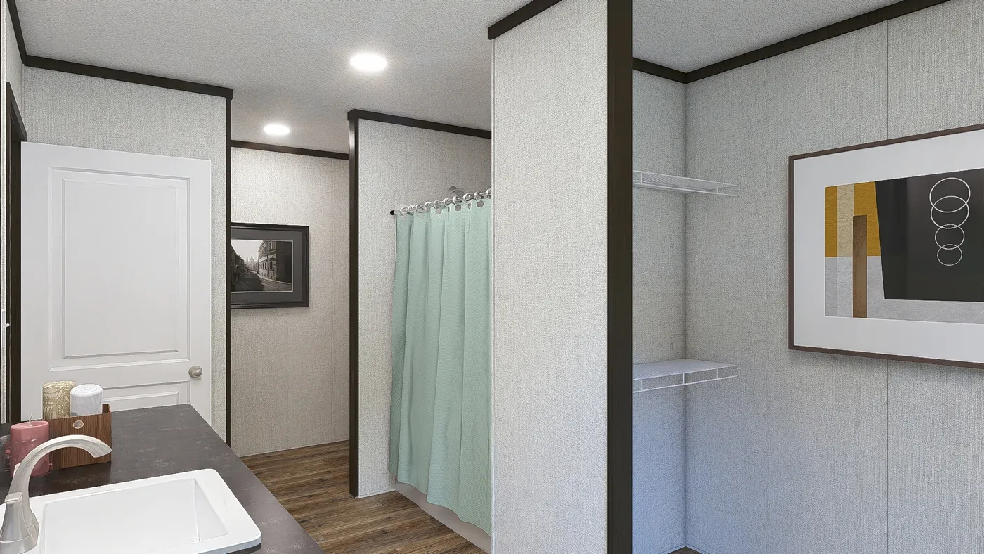 The COLOSSAL Primary Bathroom. This Manufactured Mobile Home features 3 bedrooms and 2 baths.