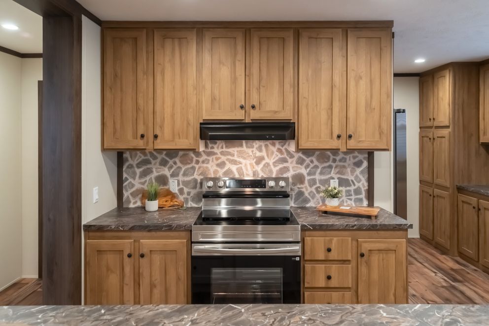 The MOUNTAIN VIEW Kitchen. This Manufactured Mobile Home features 3 bedrooms and 2 baths.