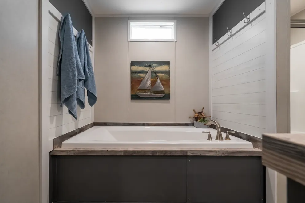 The ANNIVERSARY CHOICE Exterior. This Manufactured Mobile Home features 3 bedrooms and 2 baths.