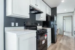 The SELECT 16602S Kitchen. This Manufactured Mobile Home features 2 bedrooms and 2 baths.