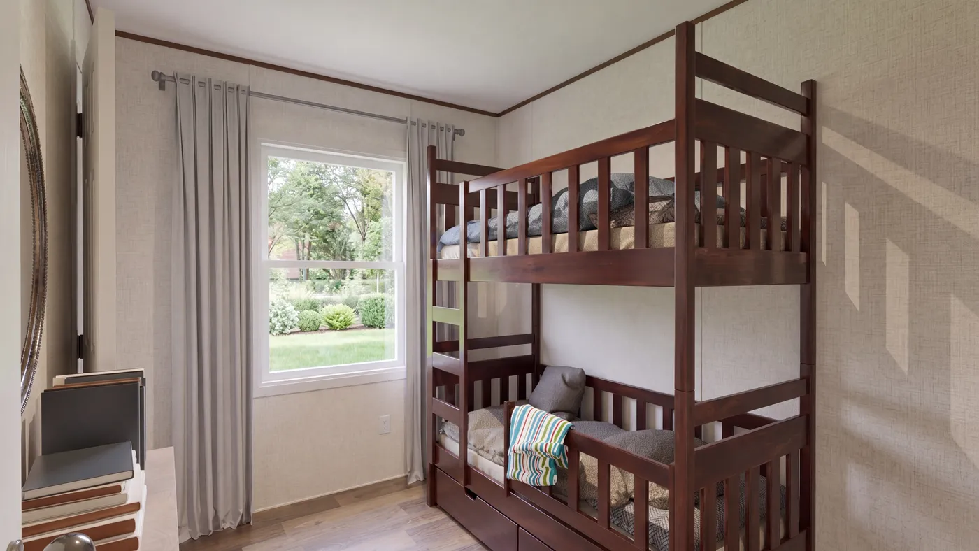 The CYPRESS Guest Bedroom. This Manufactured Mobile Home features 4 bedrooms and 2 baths.