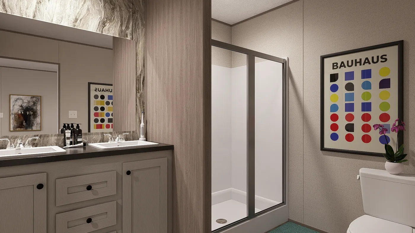 The BLAZER 66 F Primary Bathroom. This Manufactured Mobile Home features 3 bedrooms and 2 baths.