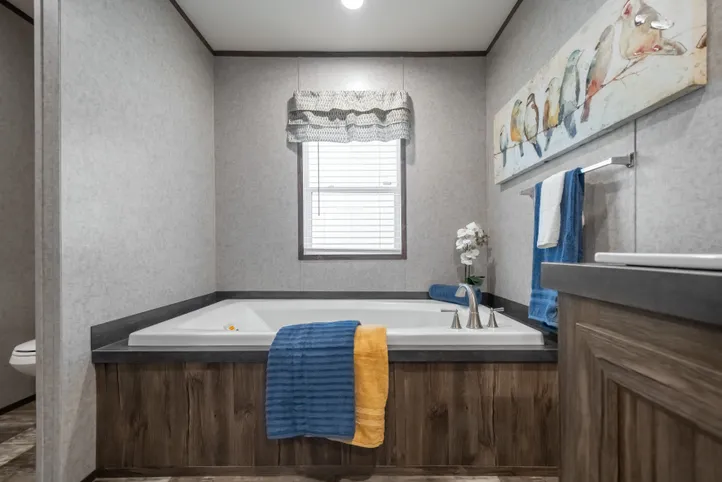 The LOCKLEAR Exterior. This Manufactured Mobile Home features 4 bedrooms and 2 baths.