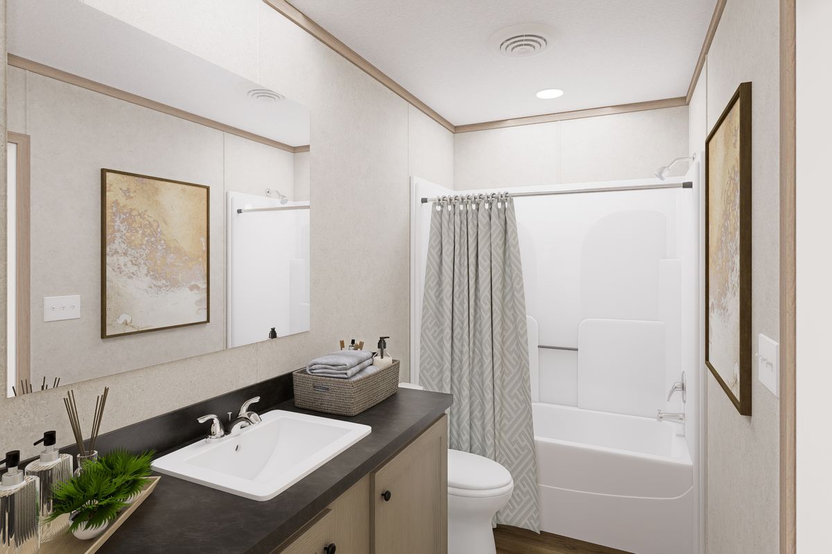 The 7616-CC01 CORNERSTONE 76 Primary Bathroom. This Manufactured Mobile Home features 3 bedrooms and 2 baths.