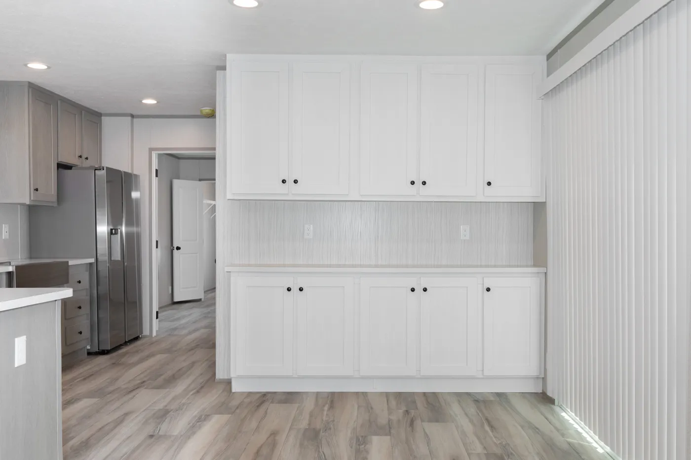 The THE ANNIVERSARY 76 Dining Area. This Manufactured Mobile Home features 3 bedrooms and 2 baths.