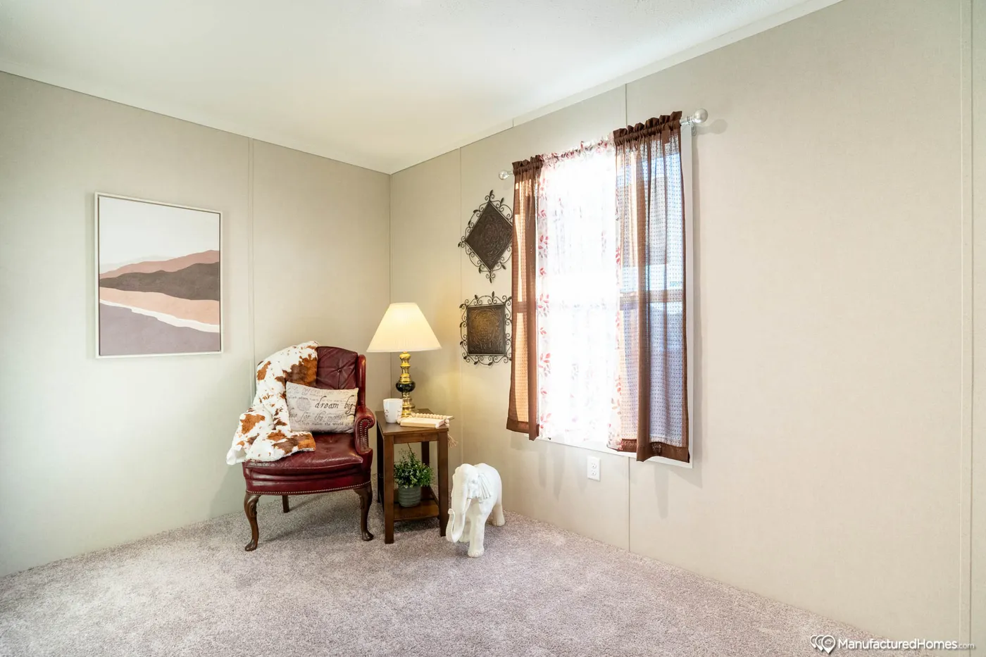 The TOPAZ 70 Guest Bedroom. This Manufactured Mobile Home features 3 bedrooms and 2 baths.