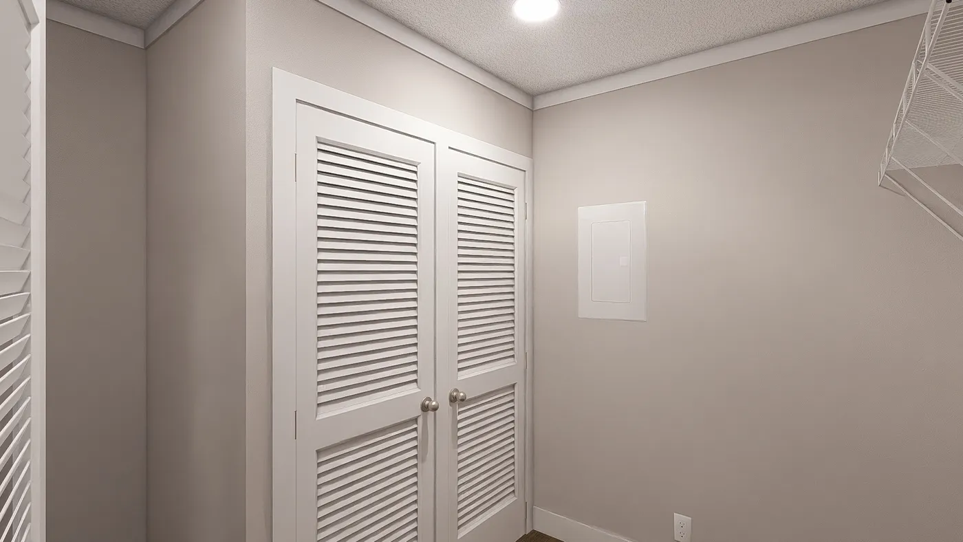 The LET IT BE Utility Room. This Manufactured Mobile Home features 3 bedrooms and 2 baths.