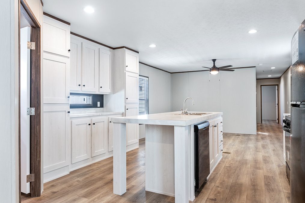 The SELECT 16723B Kitchen. This Manufactured Mobile Home features 3 bedrooms and 2 baths.