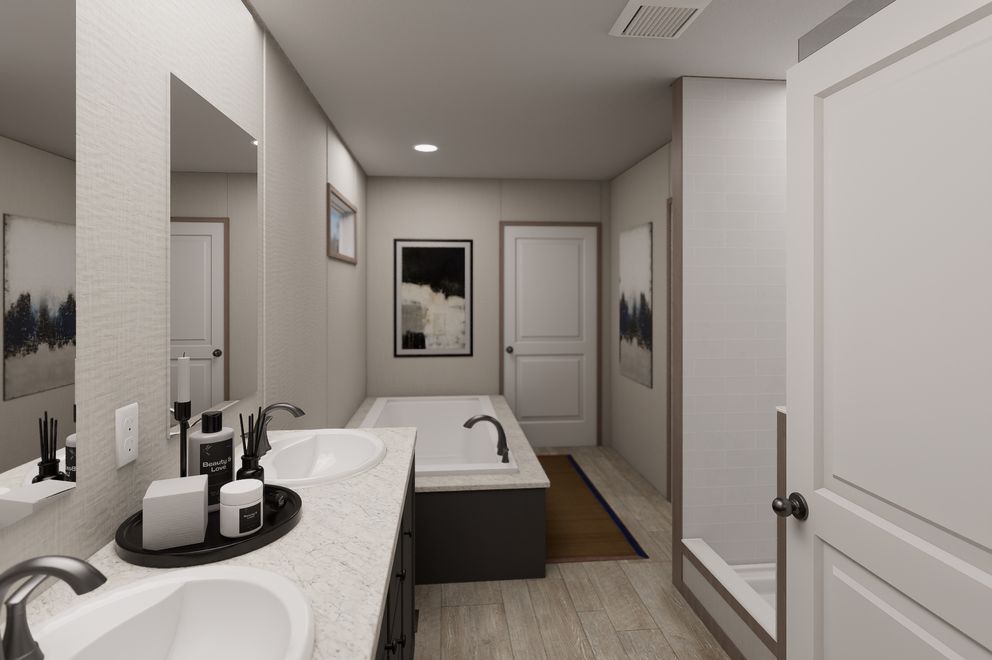 The ULTRA FLEX JEWEL Primary Bathroom. This Manufactured Mobile Home features 3 bedrooms and 2 baths.