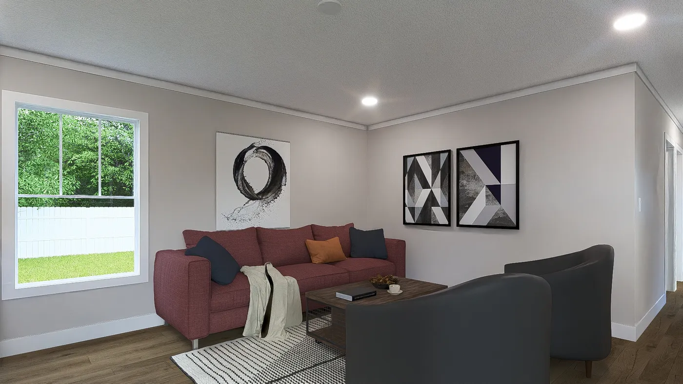 The SWEET CAROLINE Living Room. This Manufactured Mobile Home features 3 bedrooms and 2 baths.