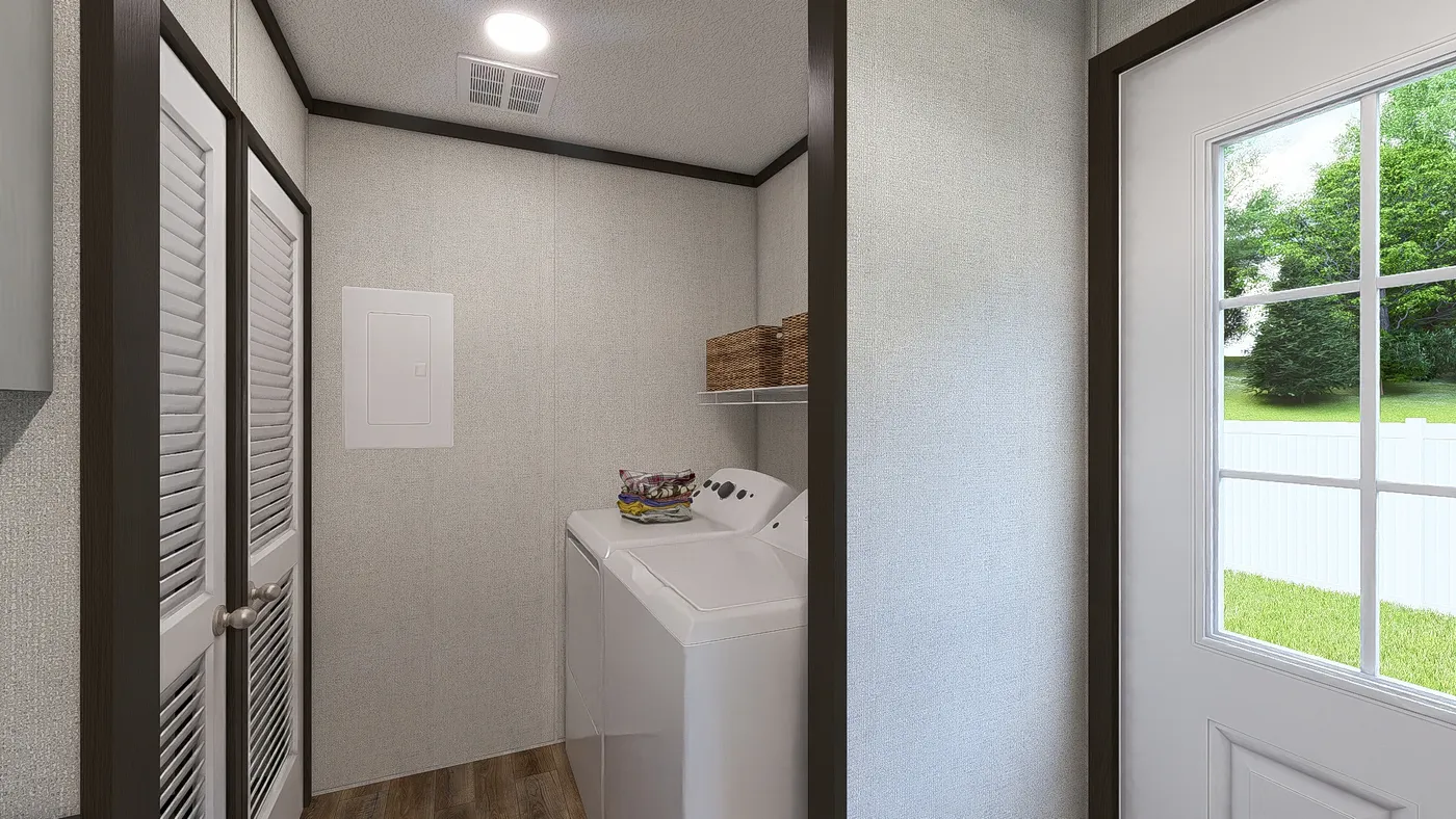 The DYNAMIC Utility Room. This Manufactured Mobile Home features 3 bedrooms and 2 baths.
