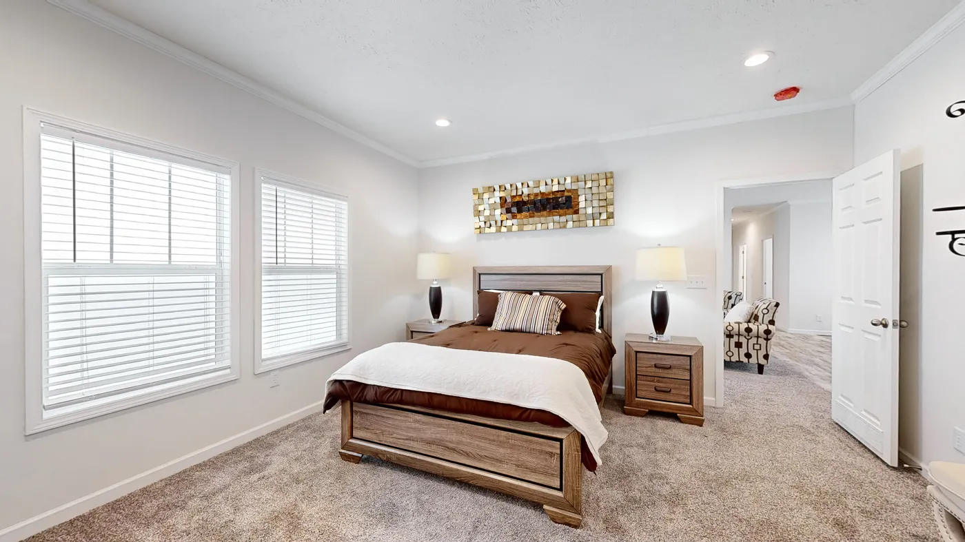 The 4872 ENTERPRISE 32X76 MODULAR Primary Bedroom. This Modular Home features 4 bedrooms and 2 baths.