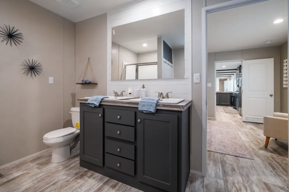 The ANNIVERSARY CHOICE Exterior. This Manufactured Mobile Home features 3 bedrooms and 2 baths.