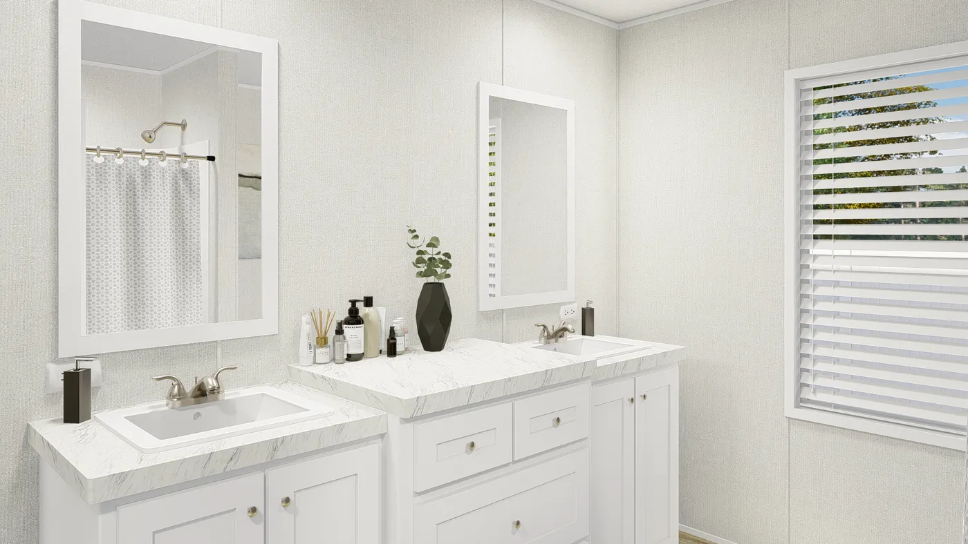 The GRAND LIVING 76 Guest Bathroom. This Manufactured Mobile Home features 4 bedrooms and 2 baths.