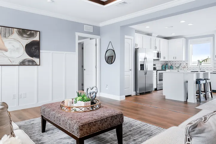 The THE ATLAS Living Room. This Manufactured Mobile Home features 4 bedrooms and 3 baths.