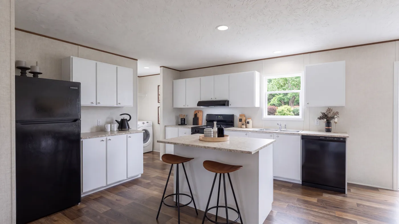 The SPRUCE Kitchen. This Manufactured Mobile Home features 3 bedrooms and 2 baths.