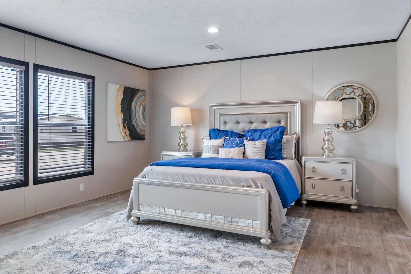 The HERCULES Primary Bedroom. This Manufactured Mobile Home features 4 bedrooms and 2 baths.