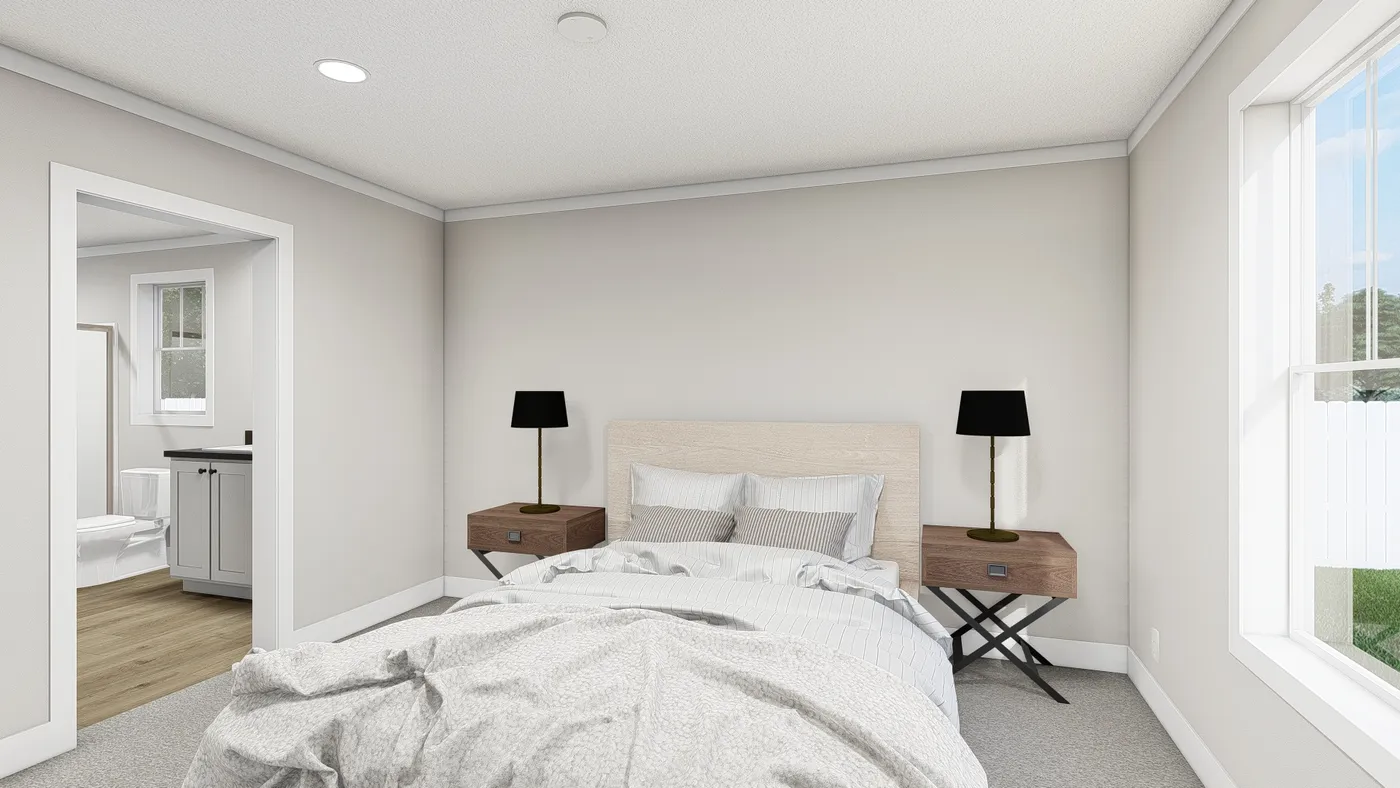 The UNDER PRESSURE Primary Bedroom. This Manufactured Mobile Home features 3 bedrooms and 2 baths.