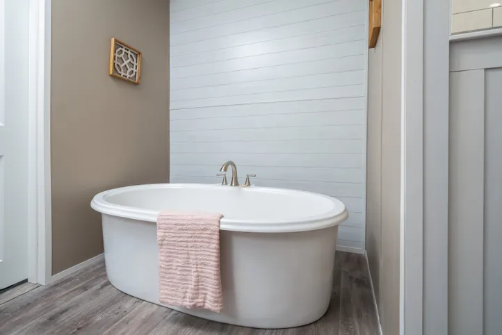 The ISLAND BREEZE Primary Bathroom. This Manufactured Mobile Home features 3 bedrooms and 2 baths.