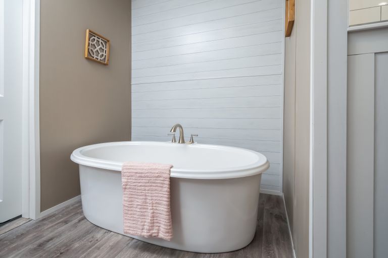 The ISLAND BREEZE Primary Bathroom. This Manufactured Mobile Home features 3 bedrooms and 2 baths.