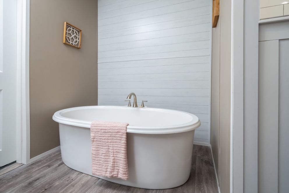 The ISLAND BREEZE Primary Bathroom. This Manufactured Mobile Home features 3 bedrooms and 2 baths.