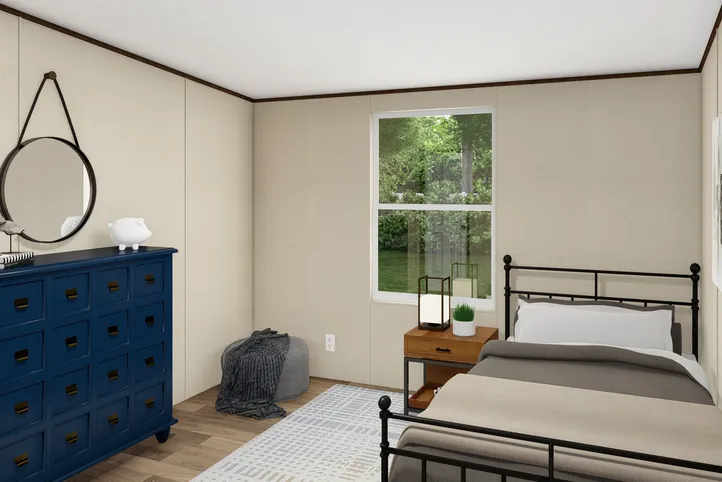 The PRIDE Bedroom. This Manufactured Mobile Home features 4 bedrooms and 2 baths.