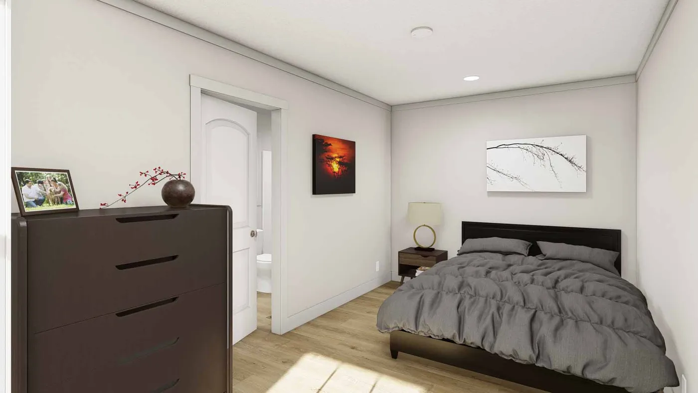 The RHYTHM NATION Primary Bedroom. This Manufactured Mobile Home features 3 bedrooms and 2 baths.