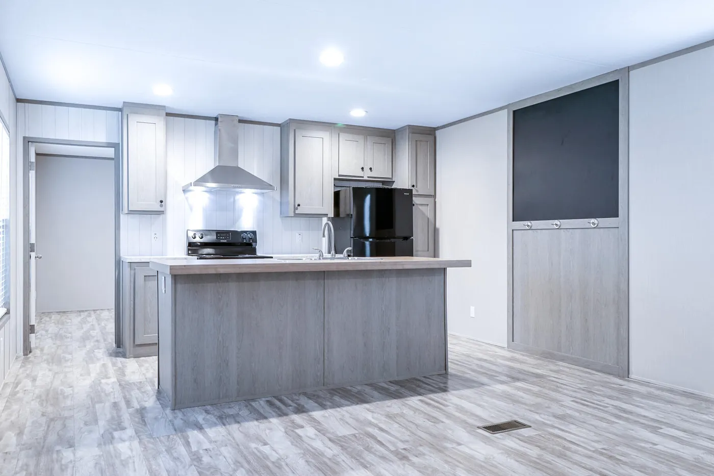 The BREEZE 16723A Exterior. This Manufactured Mobile Home features 3 bedrooms and 2 baths.