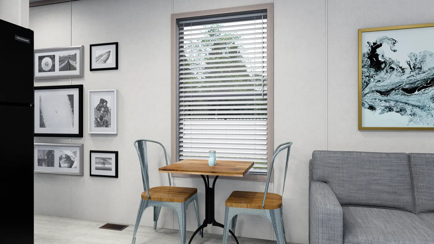The 4814-4790 THE PULSE Dining Area. This Manufactured Mobile Home features 2 bedrooms and 1 bath.
