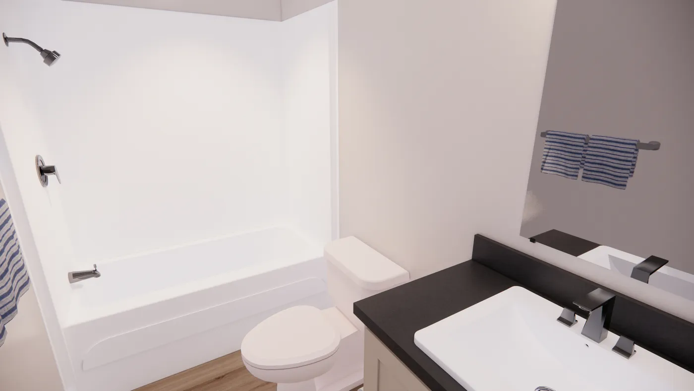 The 5228-E201 ADRENALINE Guest Bathroom. This Manufactured Mobile Home features 3 bedrooms and 2 baths.