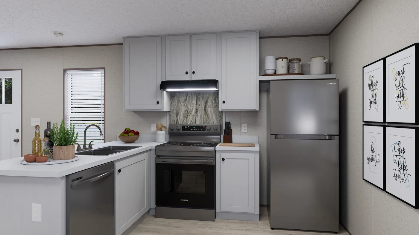 The GLACIER RIDGE Kitchen. This Manufactured Mobile Home features 2 bedrooms and 1 bath.