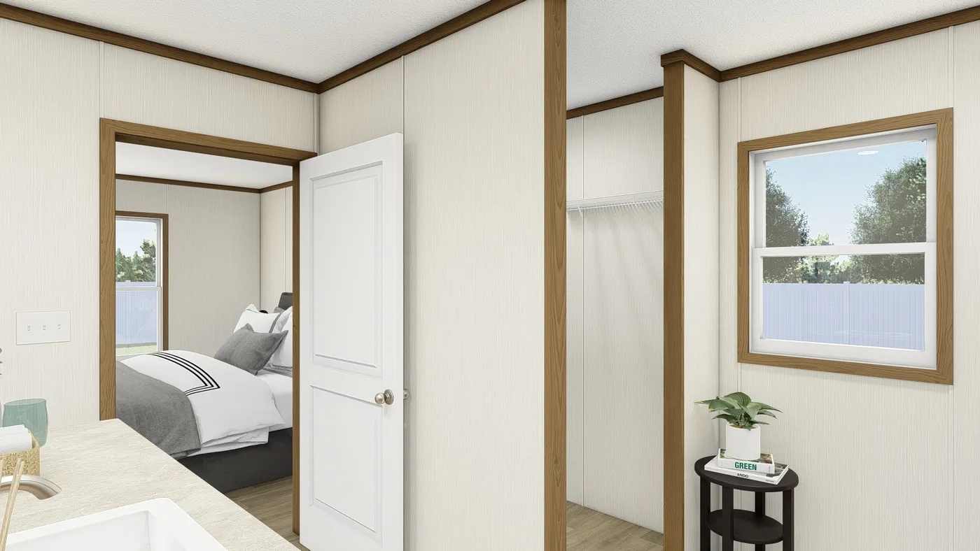 The REVEAL Primary Bathroom. This Manufactured Mobile Home features 3 bedrooms and 2 baths.
