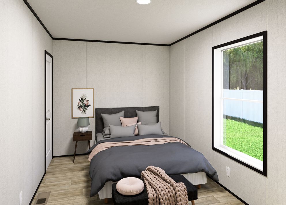 The NORTHSTAR Guest Bedroom. This Manufactured Mobile Home features 3 bedrooms and 2 baths.