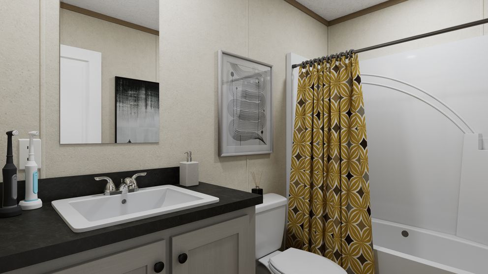 The 6014-CC02 CLEARPATH 60 Guest Bathroom. This Manufactured Mobile Home features 2 bedrooms and 2 baths.