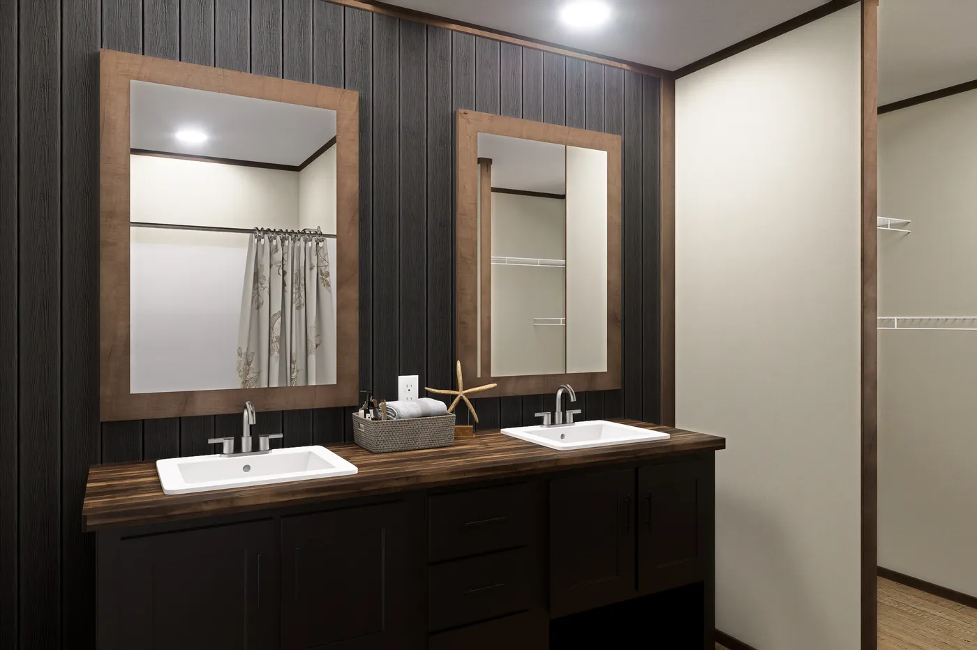 The EXPLORER Primary Bathroom. This Manufactured Mobile Home features 3 bedrooms and 2 baths.