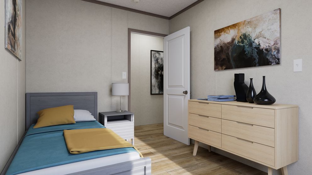The 6016-CC03 HARBORVIEW 60 Guest Bedroom. This Manufactured Mobile Home features 2 bedrooms and 2 baths.