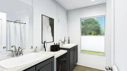 The ISLAND BREEZE 64 Guest Bathroom. This Manufactured Mobile Home features 4 bedrooms and 2 baths.