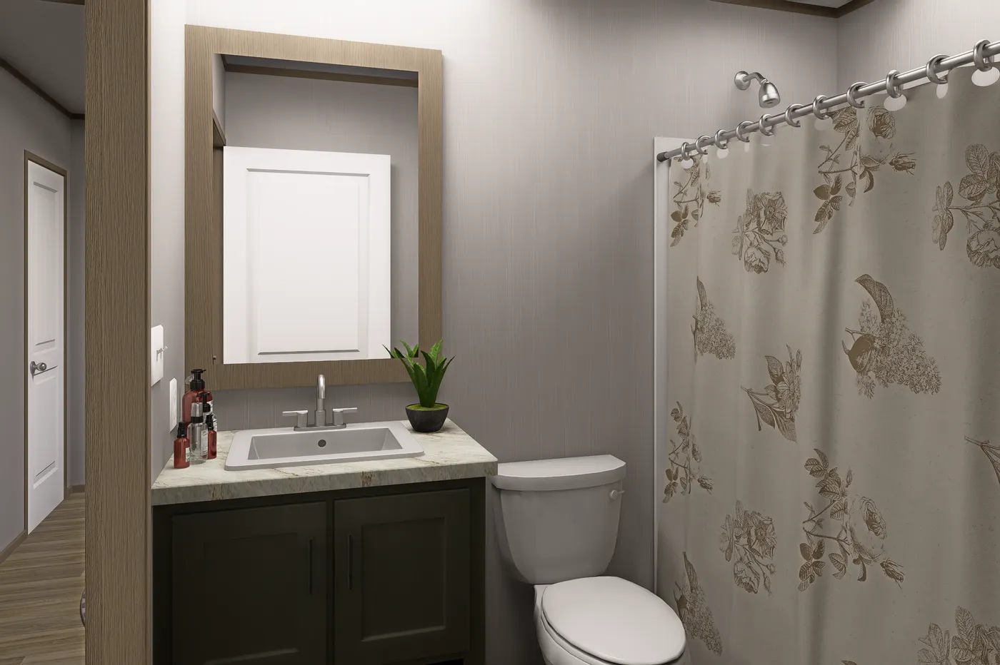 The MARINER Guest Bathroom. This Manufactured Mobile Home features 3 bedrooms and 2 baths.