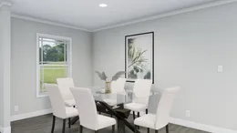 The THE BREEZE Dining Room. This Manufactured Mobile Home features 3 bedrooms and 2 baths.