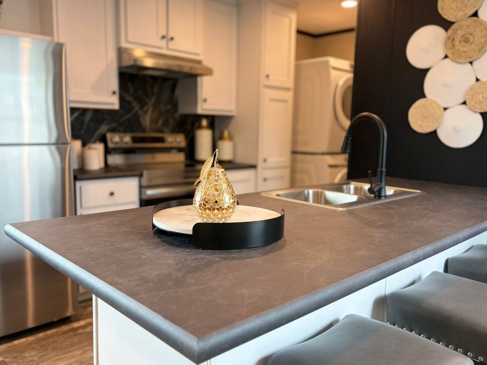 The PEARL Kitchen. This Manufactured Mobile Home features 3 bedrooms and 2 baths.