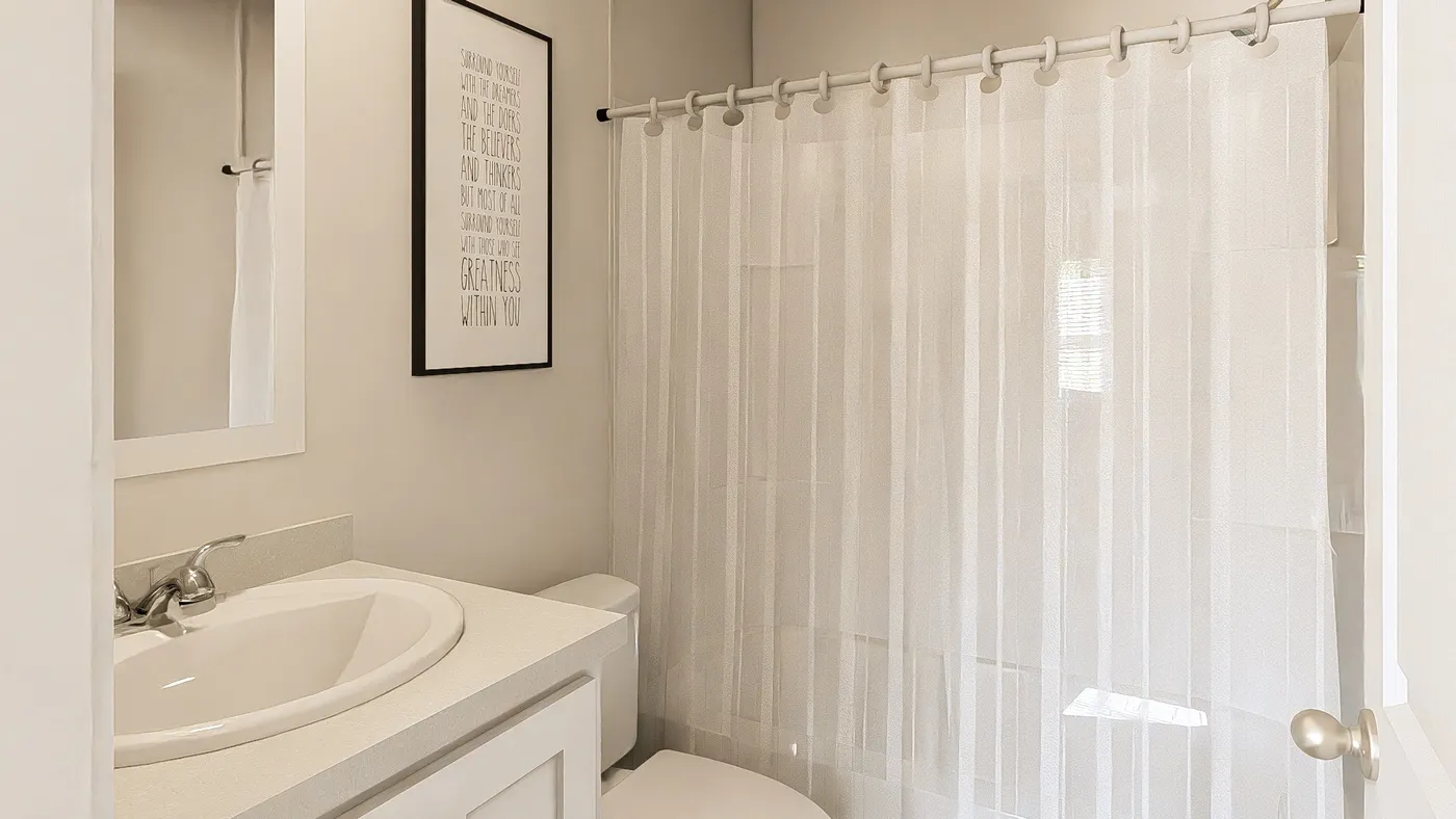 The ZIRCON Guest Bathroom. This Manufactured Mobile Home features 3 bedrooms and 2 baths.