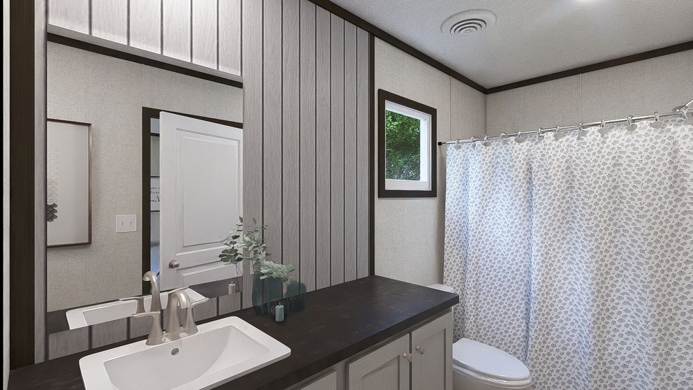 The INTUITION Primary Bathroom. This Manufactured Mobile Home features 3 bedrooms and 2 baths.