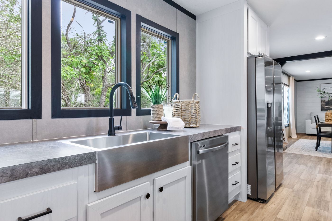 The ABSOLUTE VALUE Kitchen. This Manufactured Mobile Home features 4 bedrooms and 2 baths.