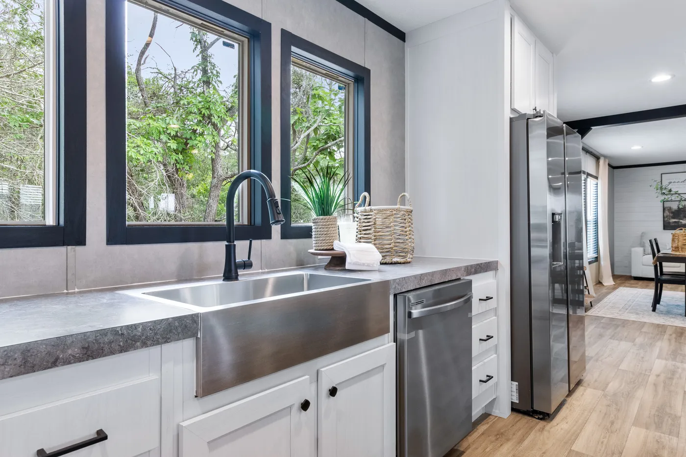 The ABSOLUTE VALUE Kitchen. This Manufactured Mobile Home features 4 bedrooms and 2 baths.