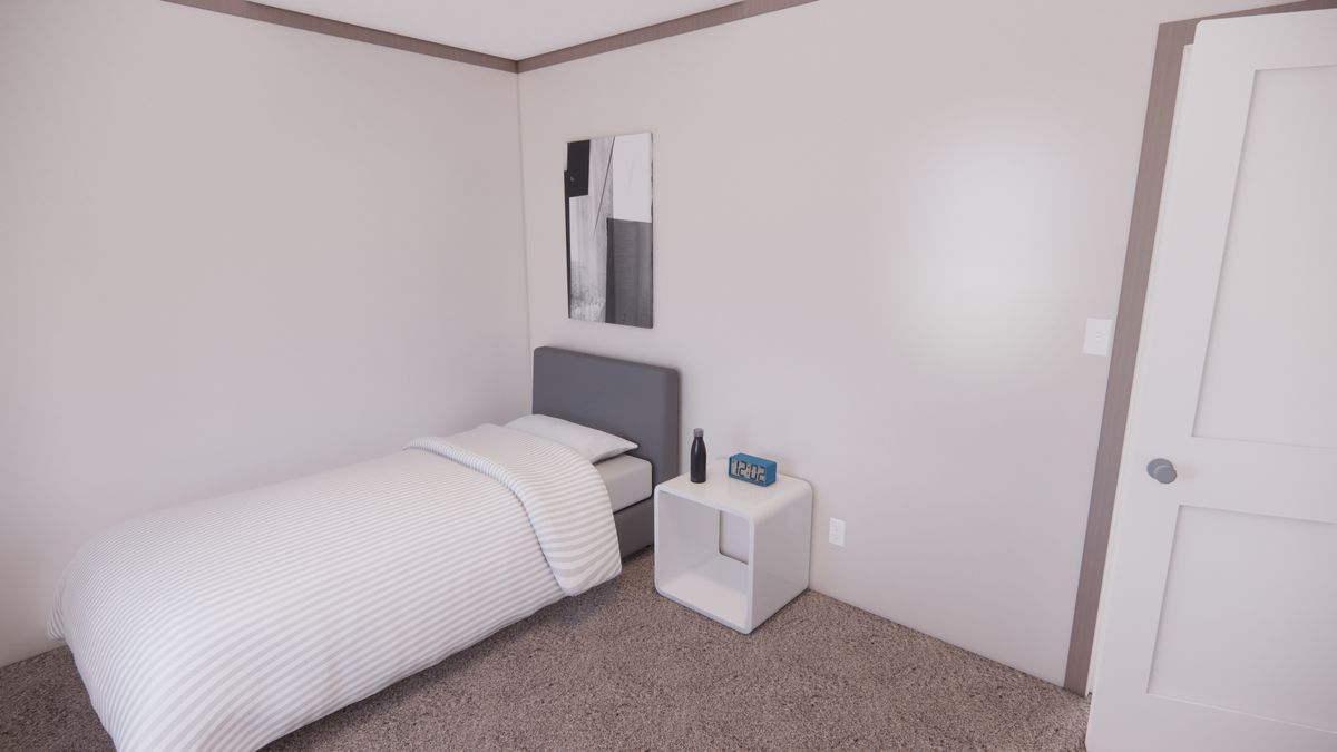 The 4828-E201 ADRENALINE Guest Bedroom. This Manufactured Mobile Home features 3 bedrooms and 2 baths.