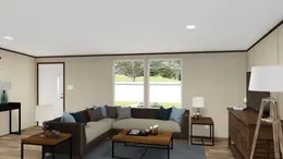 The SATISFACTION Living Room. This Manufactured Mobile Home features 3 bedrooms and 2 baths.