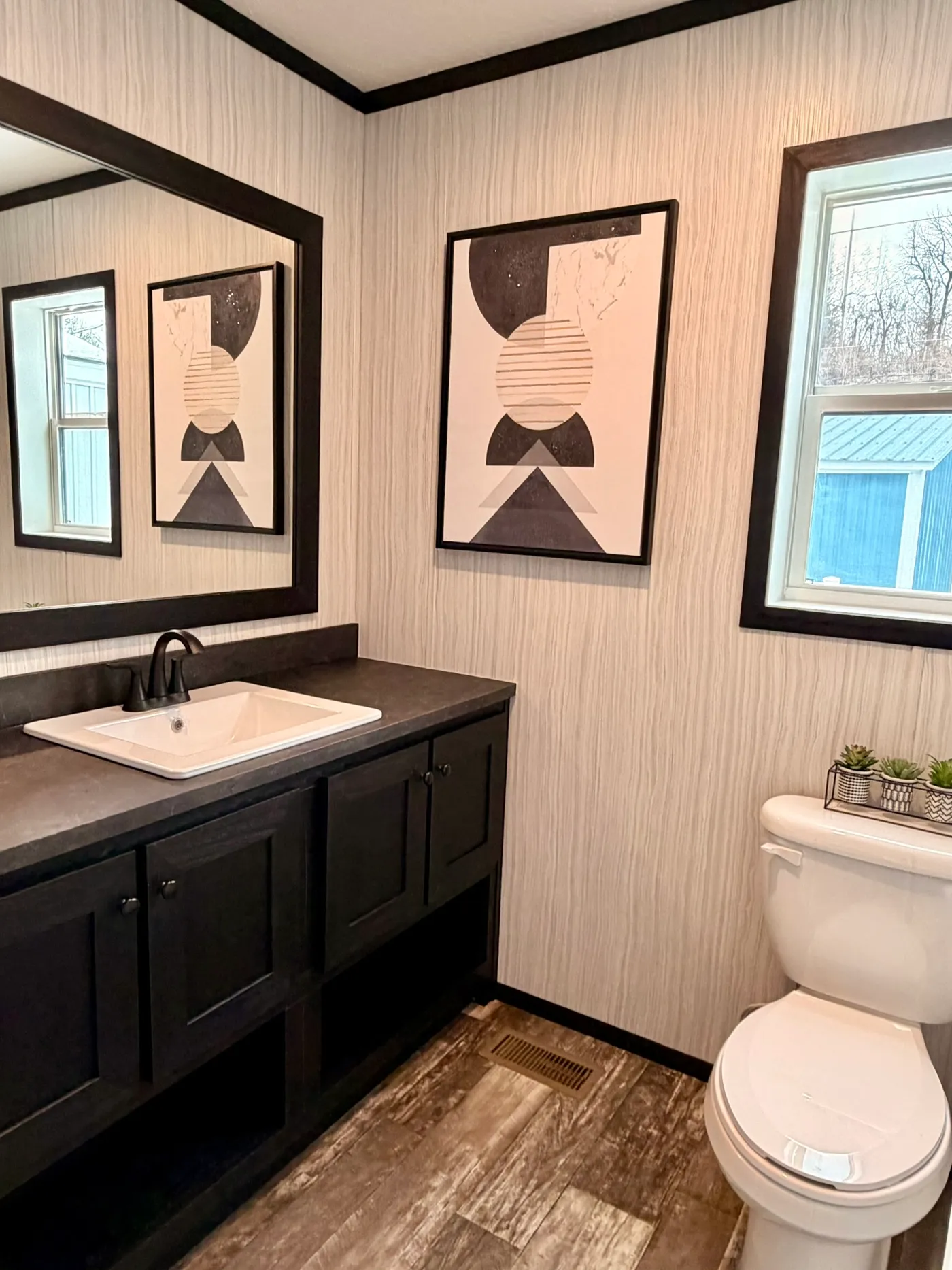 The PEARL Primary Bathroom. This Manufactured Mobile Home features 3 bedrooms and 2 baths.